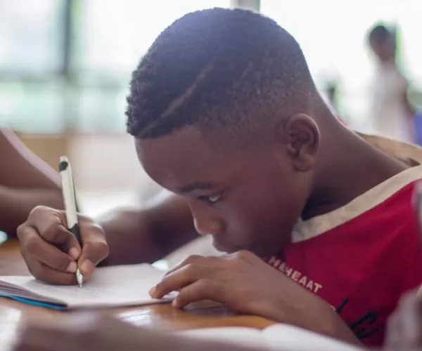 A child using a pen