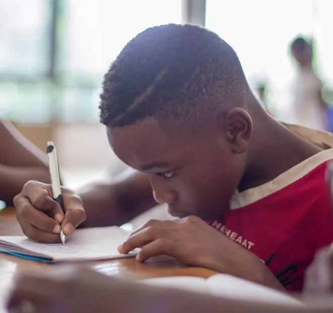 A child using a pen